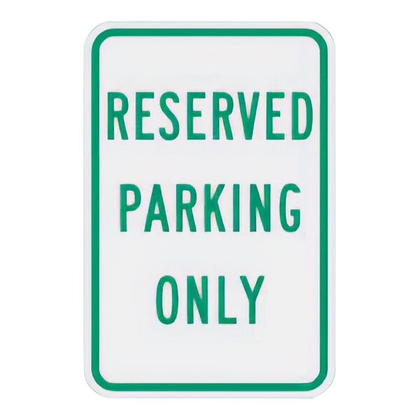 A white sign with green text that says "Reserved Parking Only" in green.