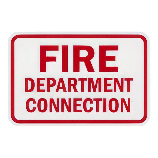 A red and white rectangular sign reading "Fire Department Connection" in red letters.