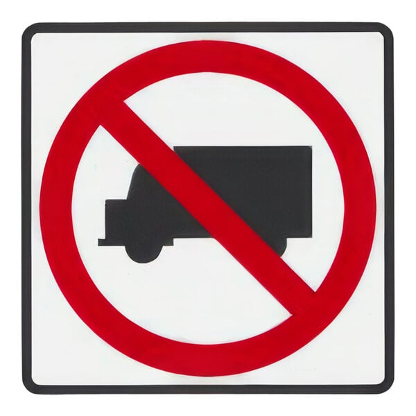 A white sign with a truck in the middle and a red circle with a line through the truck.