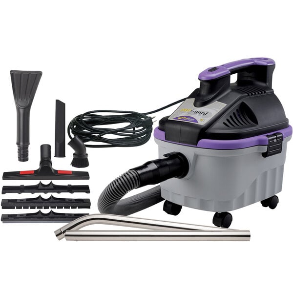 A ProTeam ProGuard wet/dry vacuum cleaner with tools.