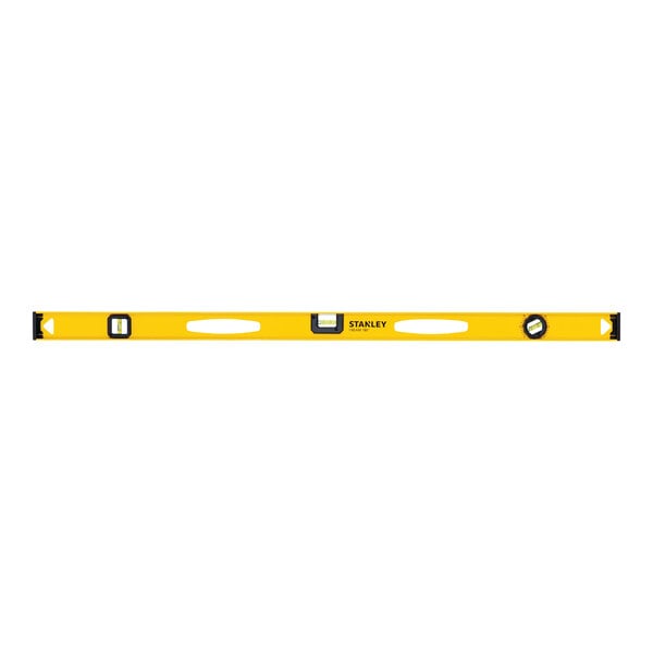 A yellow Stanley I-Beam aluminum level with black and white markings.