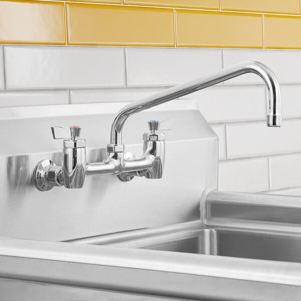 A backsplash-mount faucet with a 12-inch swing nozzle, full-flow aerator, and lever handles.