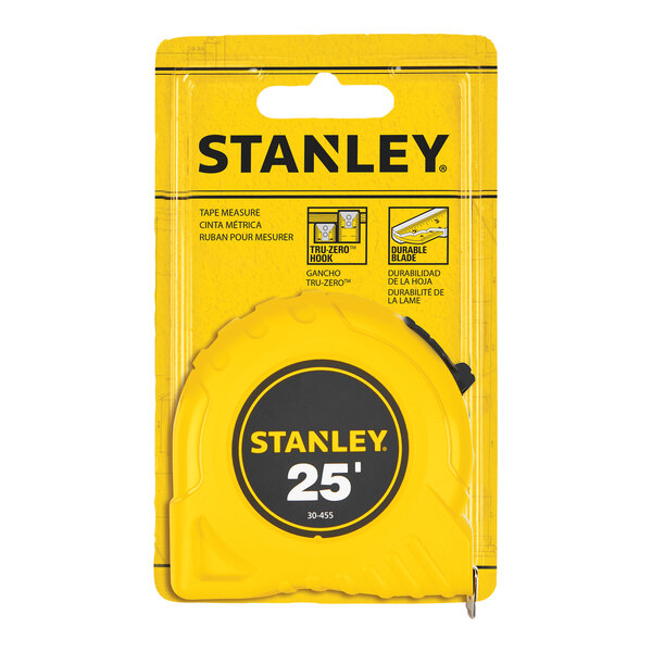 A yellow Stanley 25' tape measure in packaging with a black circle and white text.