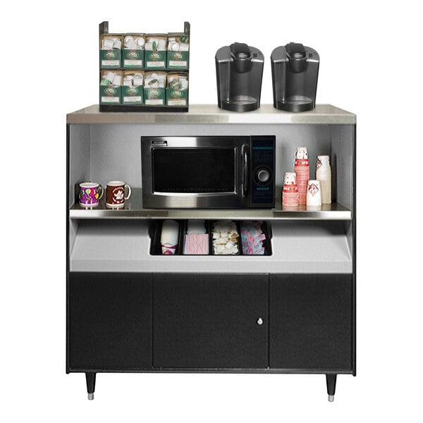 An All State Manufacturing condiment stand with a microwave and coffee maker on a counter.