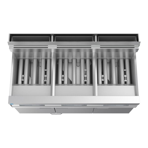 A commercial three-unit floor fryer with integrated filtration system and digital controls.
