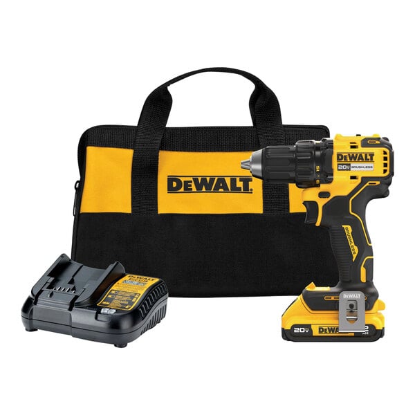 A yellow and black bag with a DeWalt cordless drill, battery, and charger.