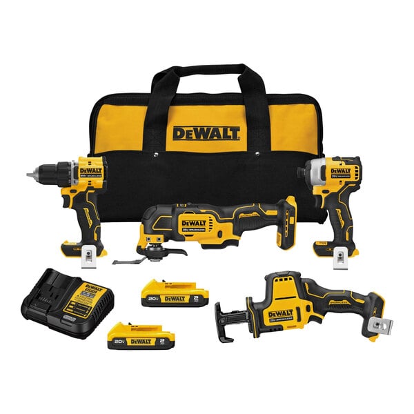 A group of yellow and black DeWalt cordless power tools, batteries, and charger in a yellow and black tool bag.