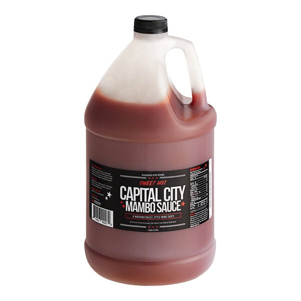 A black jug of Capital City Sweet Hot Mambo Sauce with a white cap.