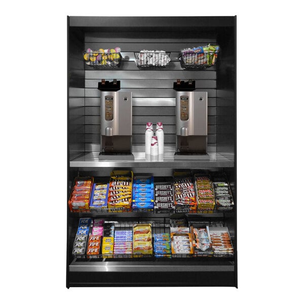 A stainless steel All State Manufacturing micro market stand with shelves holding candy, snacks, and drinks.