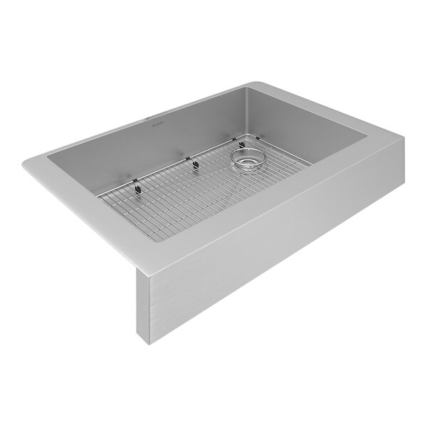 A Zurn Elkay stainless steel sink with a drain and grid.
