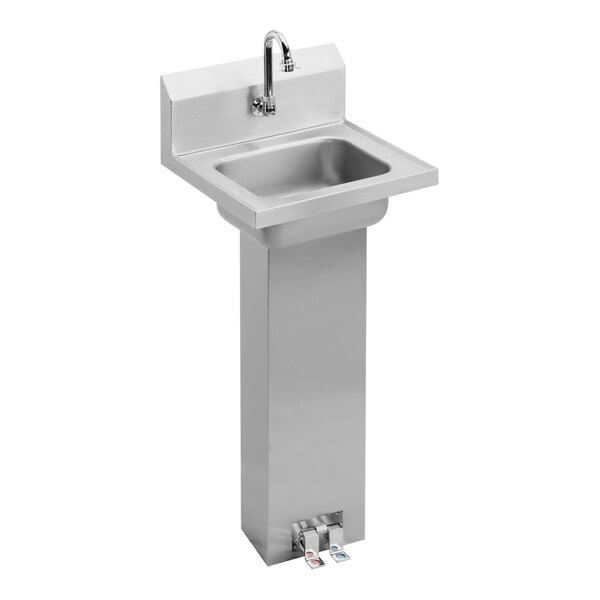 A Zurn stainless steel wall-mount hands-free sink with a double foot-operated faucet.