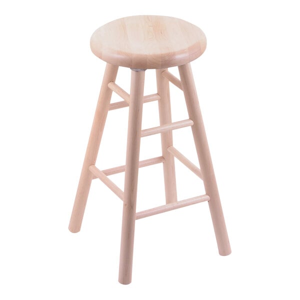 A Holland Bar Stool maple swivel bar stool with a seat and back.