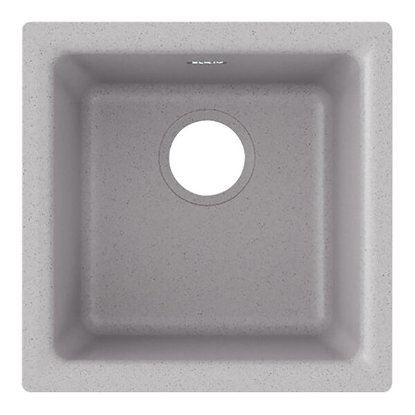 A greystone Zurn Elkay Quartz sink with a hole in the center.