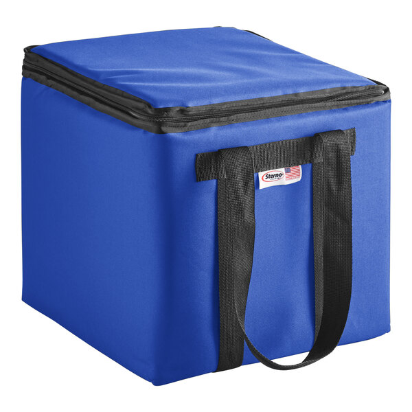 A Sterno Royal Blue Nylon Insulated Delivery Food Carrier with black straps.