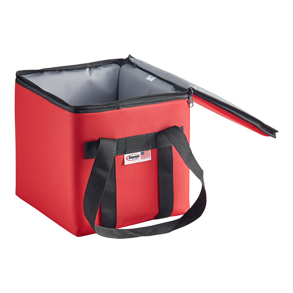 A red Sterno insulated delivery food carrier with a black handle.
