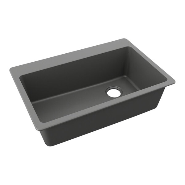 A Zurn Elkay Quartz Classic graphite sink with a drain hole.