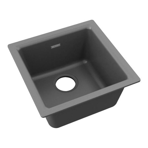 A grey Zurn Elkay Quartz sink with a hole in the middle.