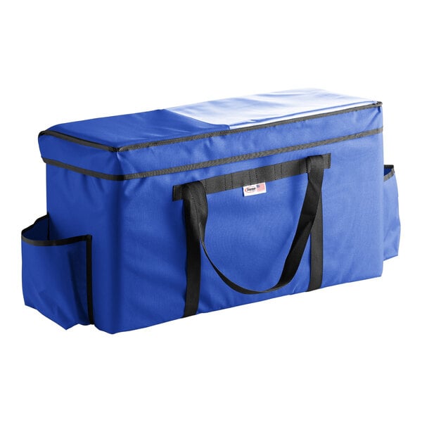 A Royal Blue Sterno insulated food carrier with black straps.