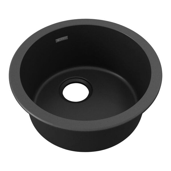 A black round Zurn Elkay Quartz Classic bar sink with a hole in the center.