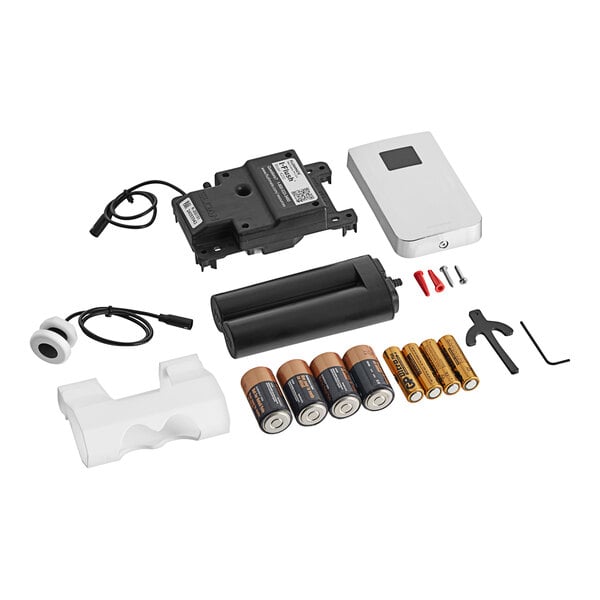 The white rectangular Flushmate I-Flush battery pack with a black square button.