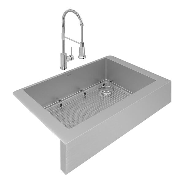 A Zurn Elkay stainless steel sink with a faucet and drain.