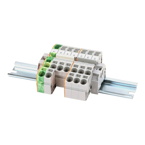 A group of Henny Penny Terminal Blocks with green and white wires.