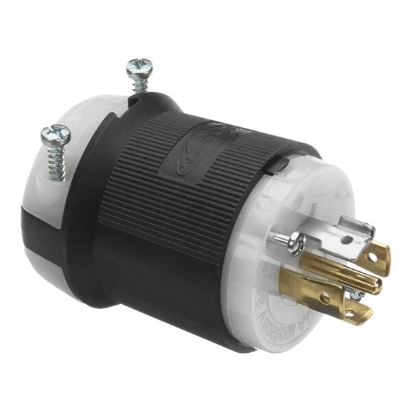 A black and white electrical plug with gold and silver screws.