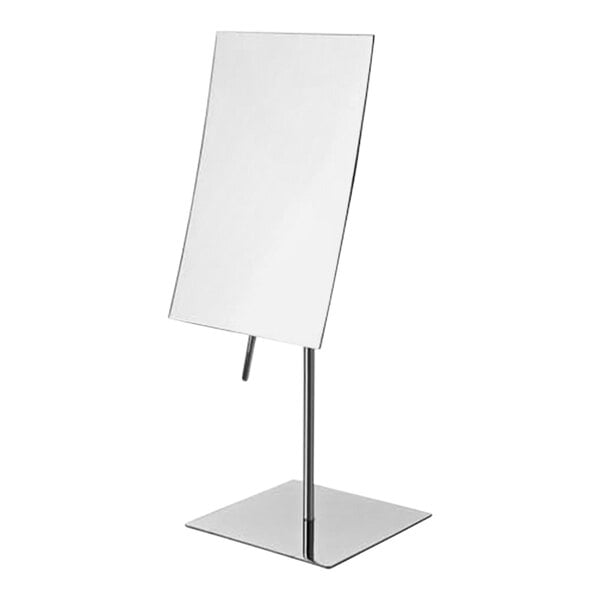 A rectangular chrome tabletop mirror on a stand.