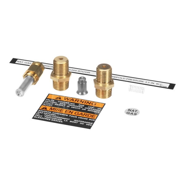 A Henny Penny natural gas to liquid propane conversion kit with brass and silver parts, including a gold plated brass nut.