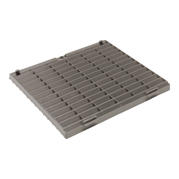 A grey plastic drain cover with many small squares.