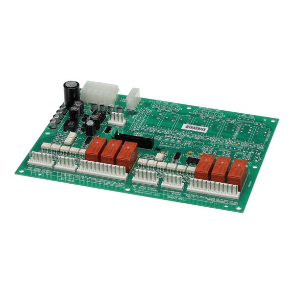 A green Henny Penny 80998 circuit board with many small components.