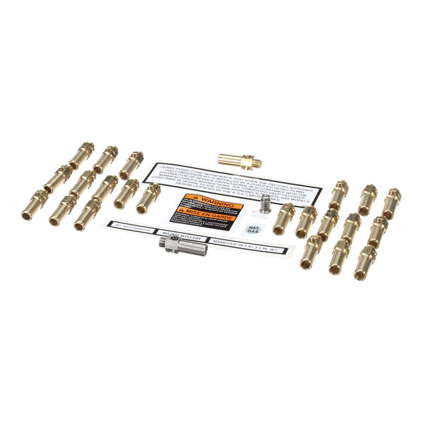 A group of brass Henny Penny connectors.