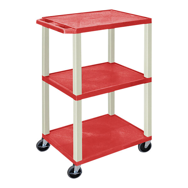 A red rectangular Luxor plastic utility cart with three shelves and heavy-duty casters.
