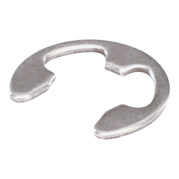 A close-up of a silver metal retaining ring with a hole in it.