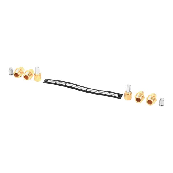 A black and white Henny Penny conversion kit with brass fittings and nuts.