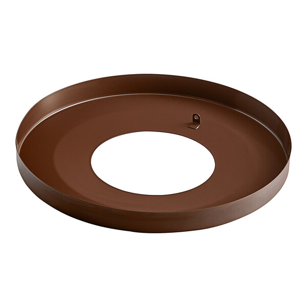 A round brown metal lid with a white circle in the center.