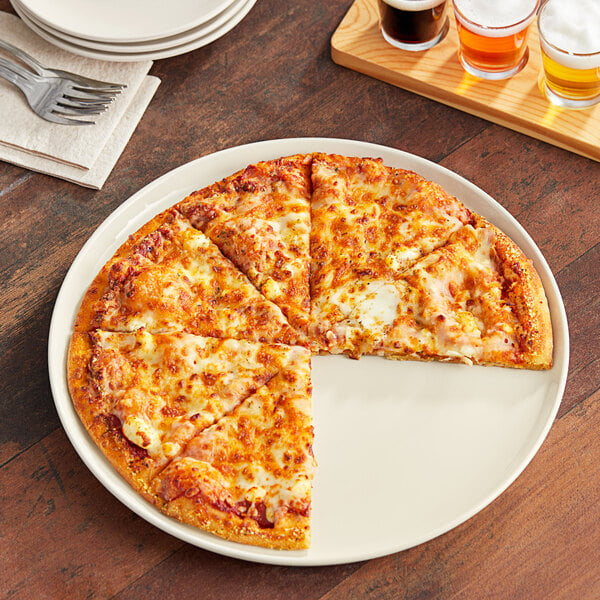 An Acopa stoneware plate with pizza slices.