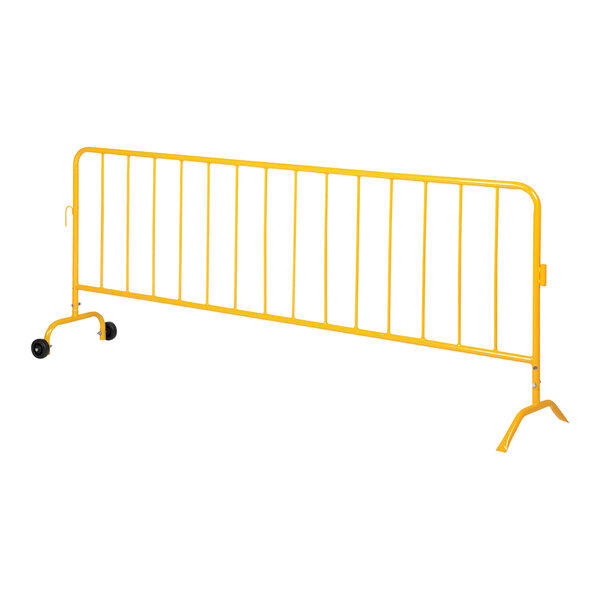 A yellow metal fence with wheels.