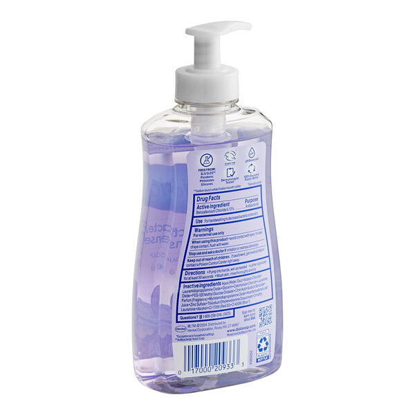 A bottle of Dial Lavender & Jasmine liquid hand soap with a label.