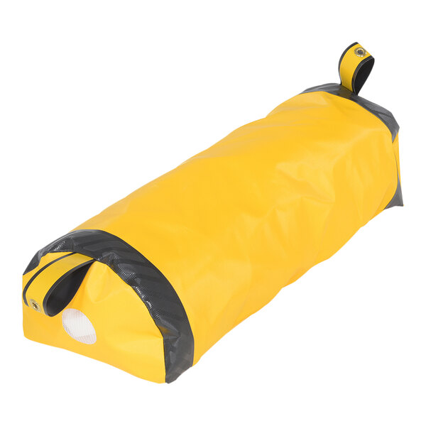 A yellow and black bag with "Vestil Dock Seal Draft Blocker" on it.