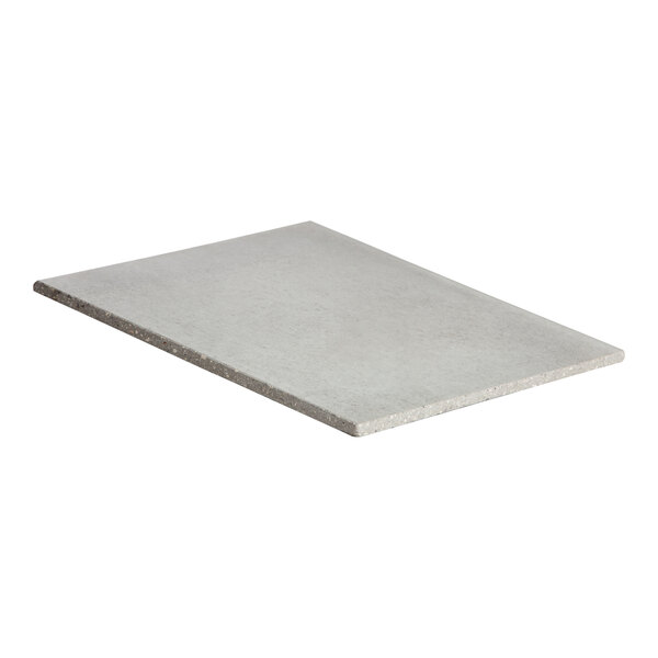 A white rectangular XpressChef pizza stone.