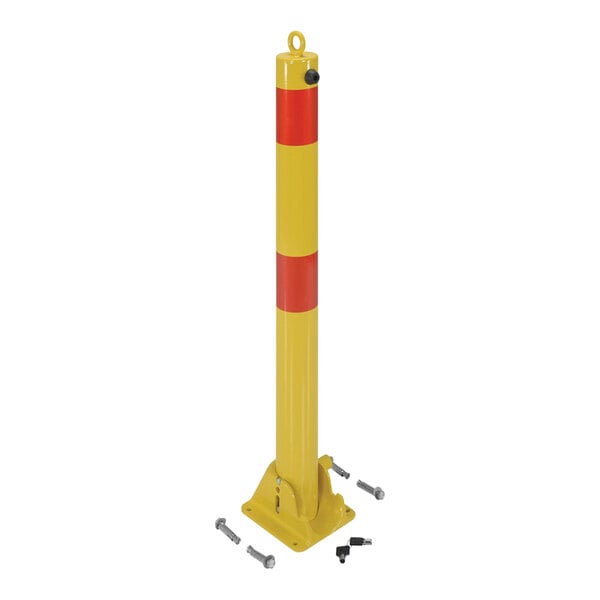 A yellow and red steel fold-down bollard.