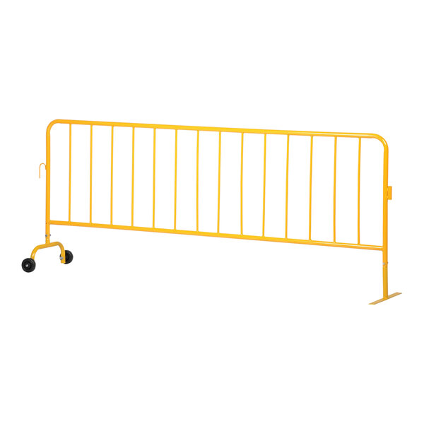 A yellow metal fence with wheeled and flat feet.