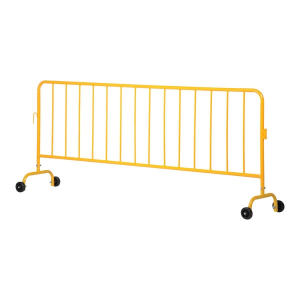 A yellow metal fence with wheeled feet.