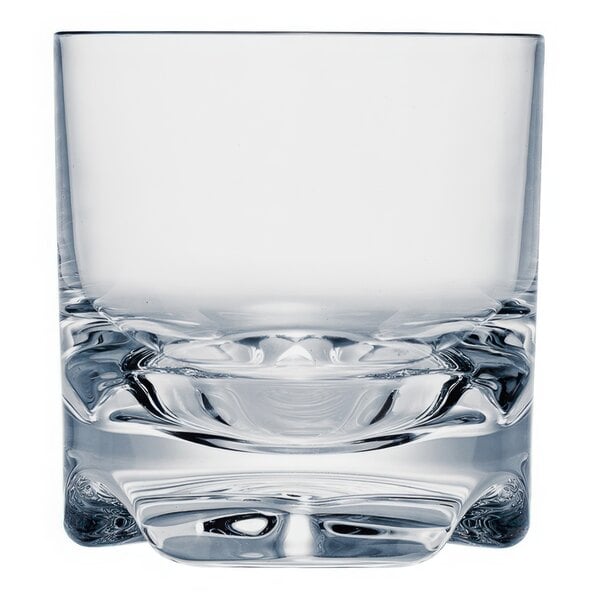 A close up of a Strahl Vivaldi rocks glass with a curved bottom.