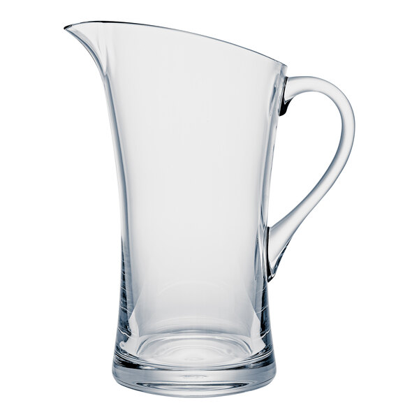 A clear plastic pitcher with a handle.