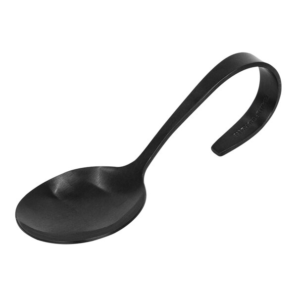 A Front of the House Matte Black Bent Taster Spoon with a curved handle.