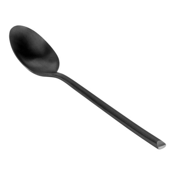 A black spoon with a long handle.