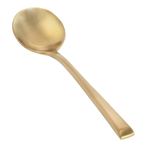 A Front of the House Parker 18/10 stainless steel soup spoon with a matte brass finish on the handle.