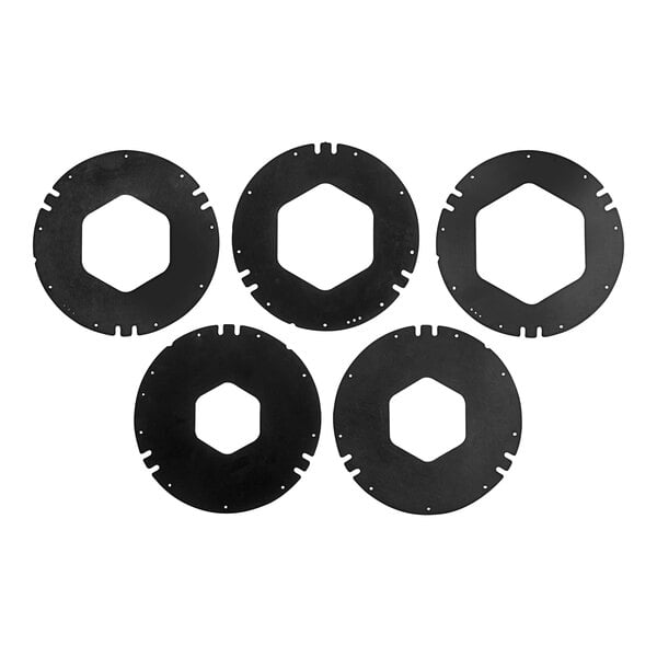 A white countertop with four black circular KleanTake cup dispensers.